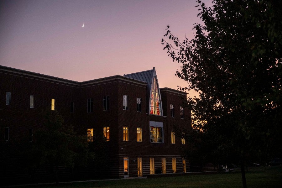 The moon shining over the Lipscomb campus