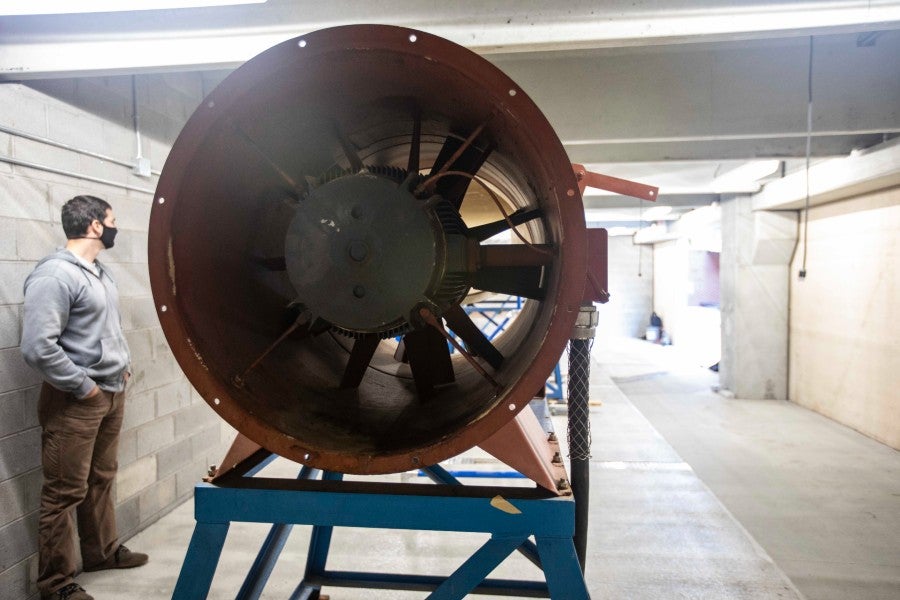 Wind tunnel fan and team leader