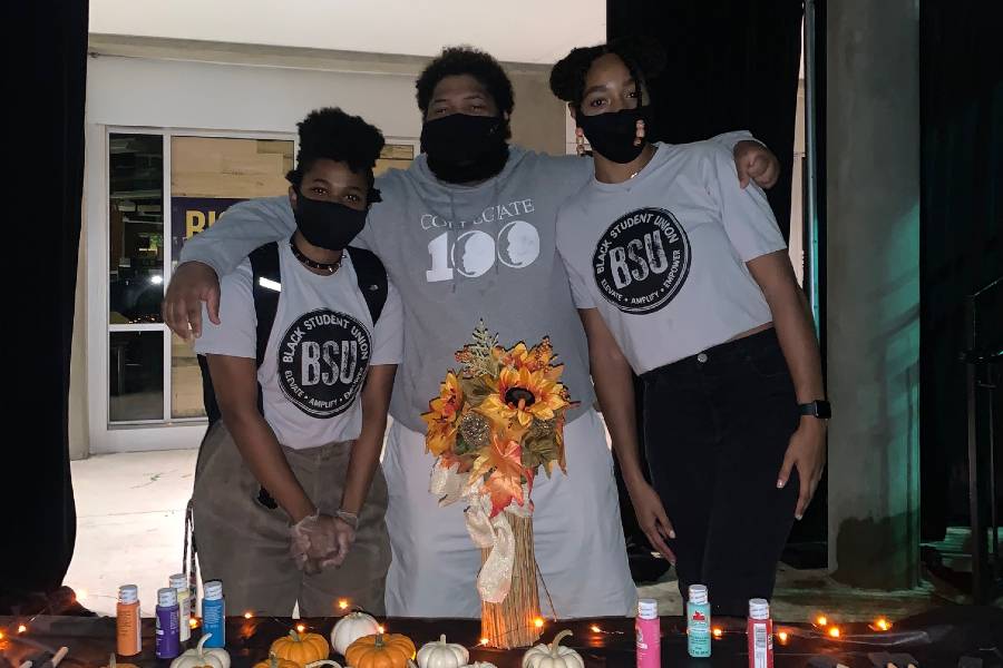 Photo of students with pumpkins