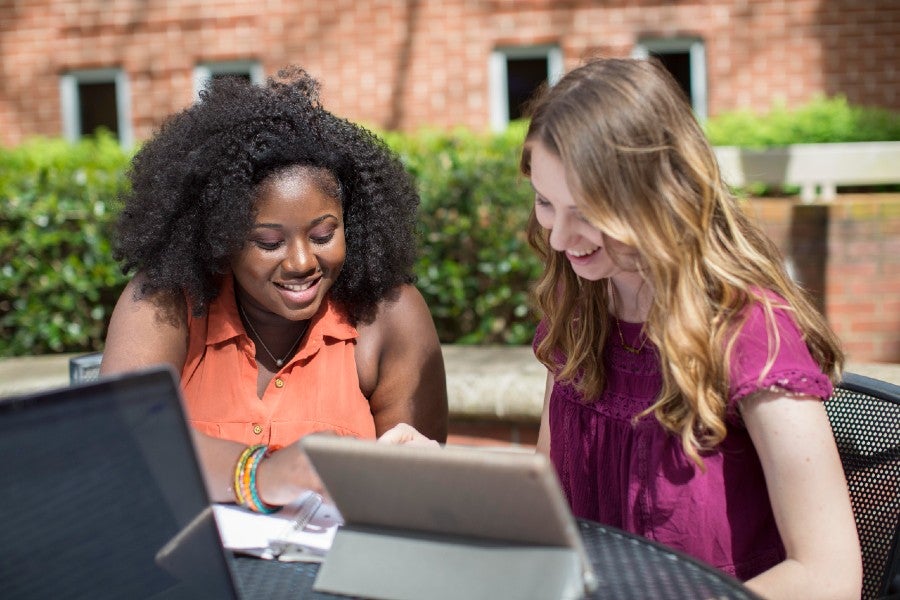 Students studying together on campus