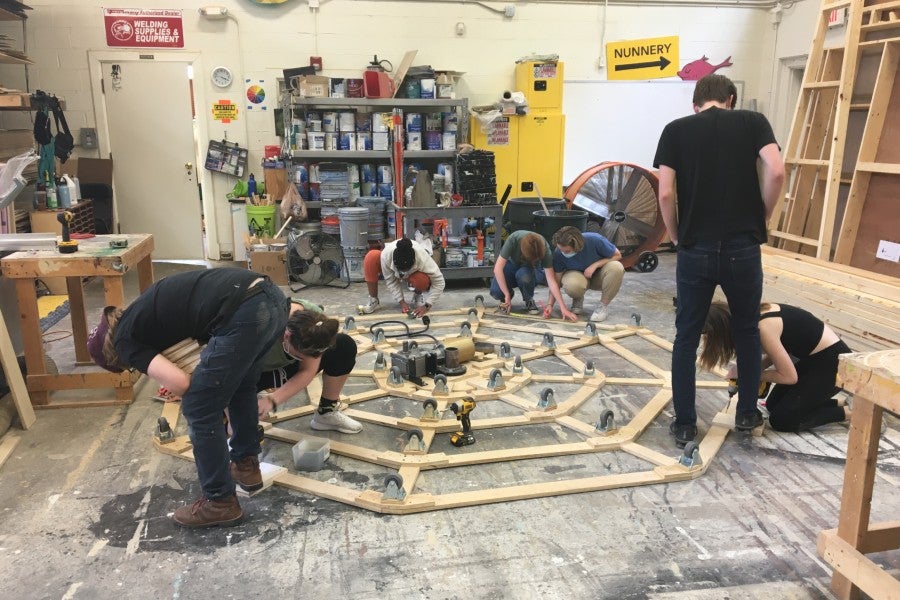 Theatre students constructing the revolve