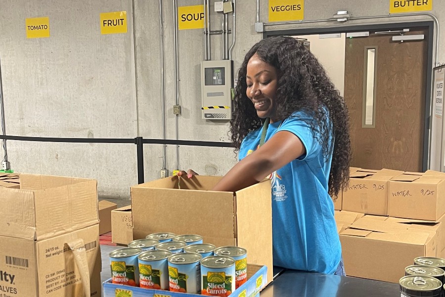 Lexi Trice packing food at Second Harvest