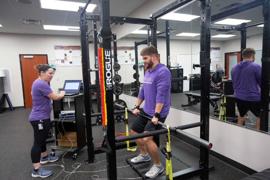 Students in the kinesiology strength and conditioning lab