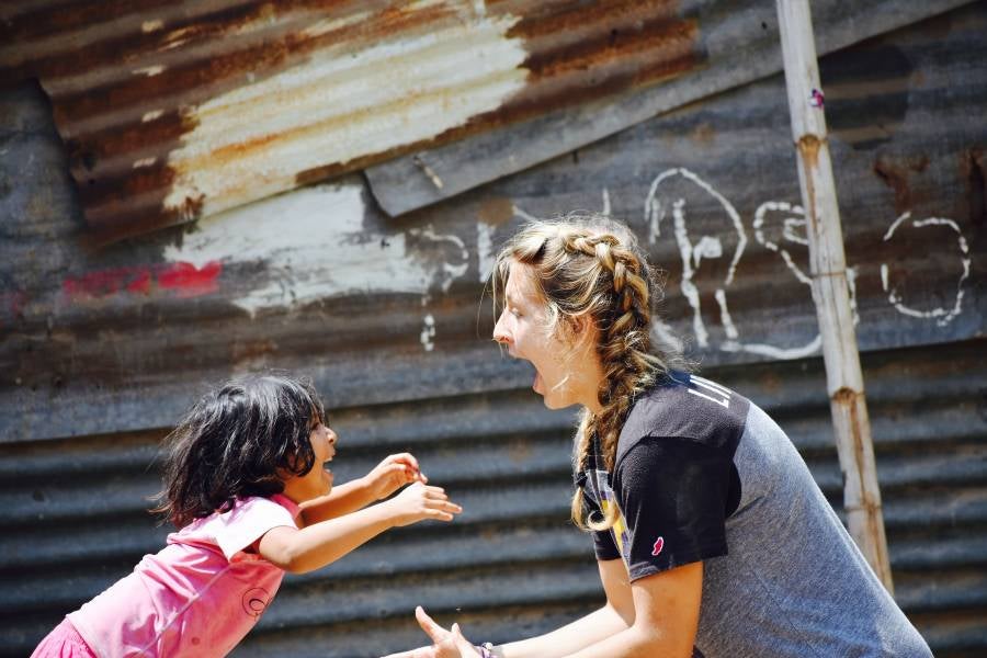 Student and child at mission site