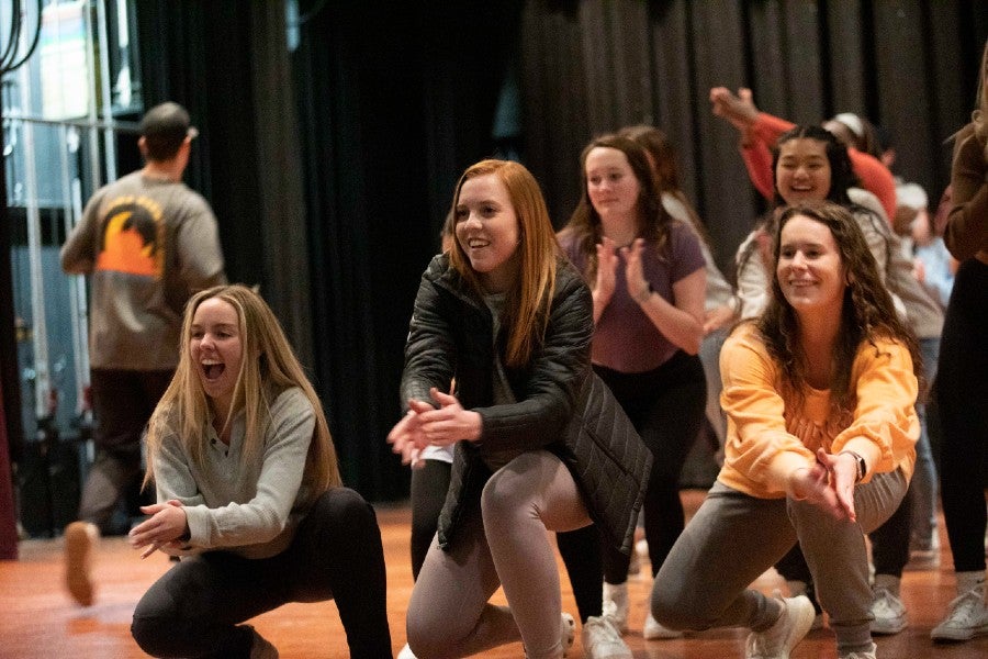 Students rehearsing one of the dance numbers