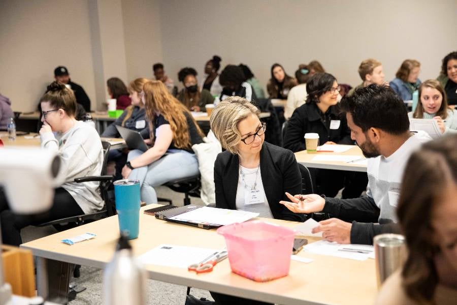 Teachers in a professional development session in the College of Education