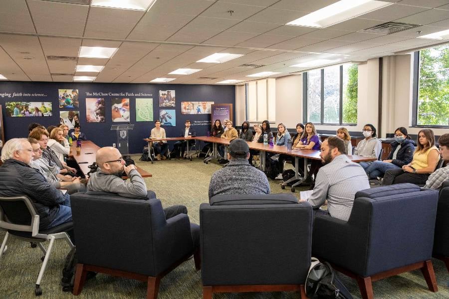 Students and faculty in the McClure Center for faith & science