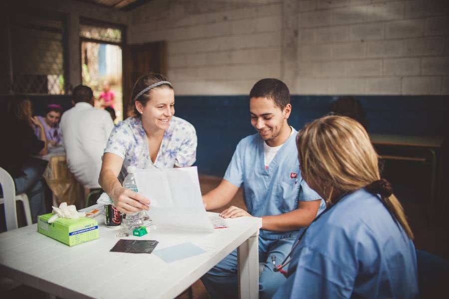 Students working in a medical clinic. 