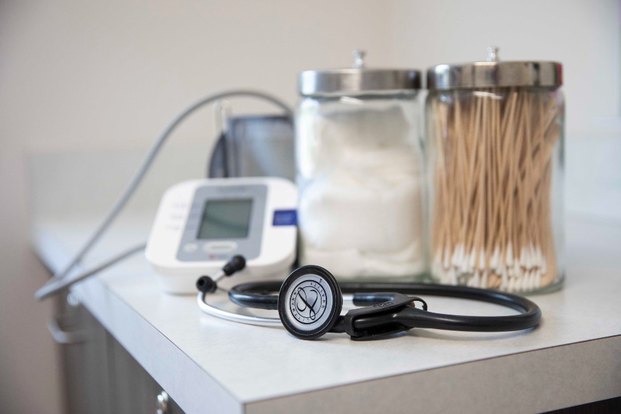 A stethoscope and medical supplies