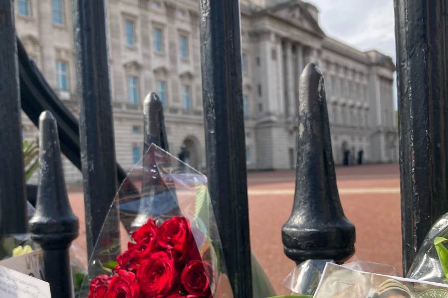 Flowers at the gate of Buckingham Palace.