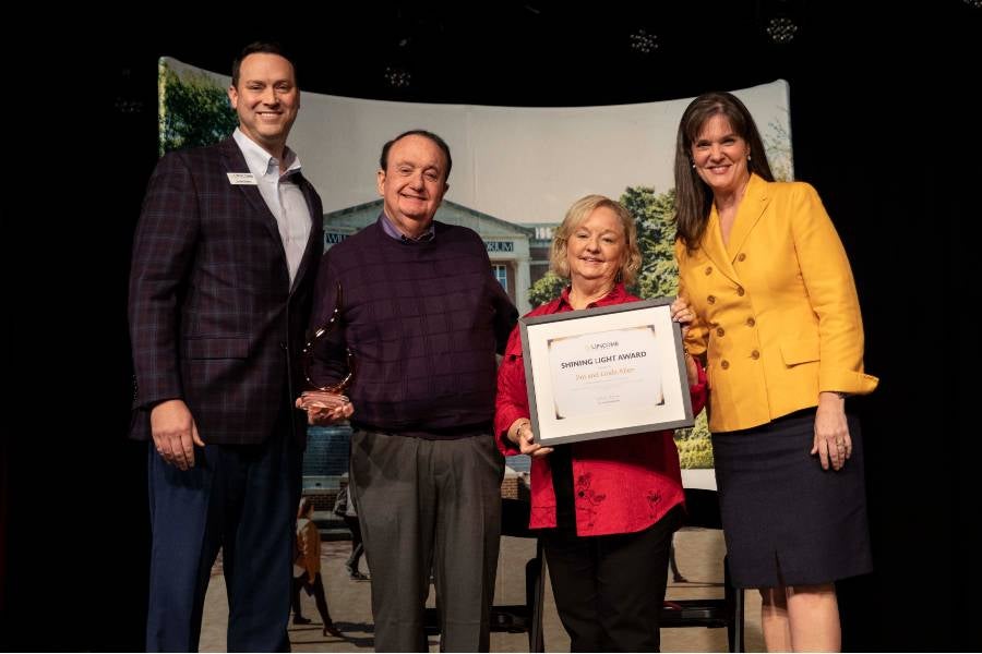 Matt Paden, Jim and Linda Allen, and Dr. Candice McQueen.