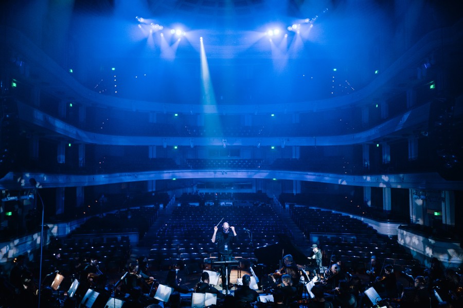 Orchestra rehearsing for concert in Fisher Hall