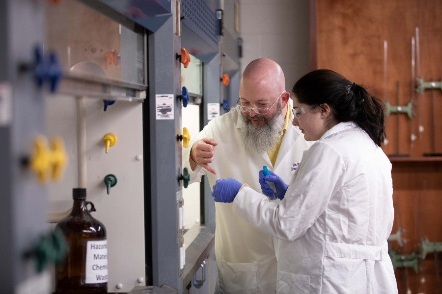 Dr. Brain Cavitt works with student Anna Froemming