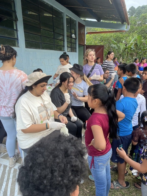 Guatemala Med-Coban Team Members Assess Patients