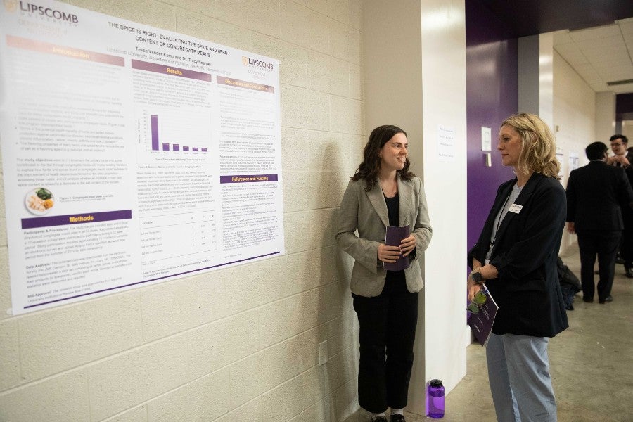 Tessa Vander Kamp with Tracy Noerper at the Student Scholars Symposium