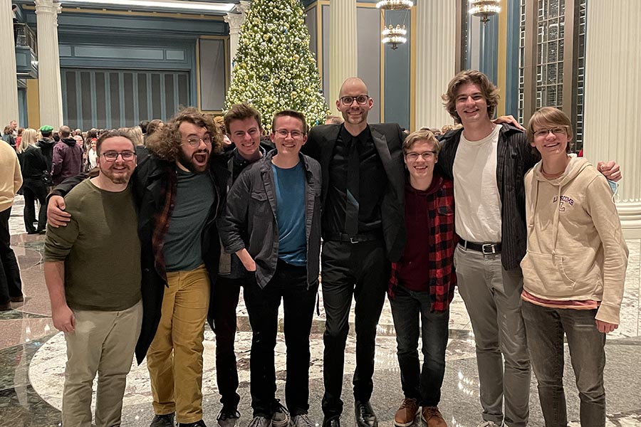 Ben Blasko with seven of the students who worked with him on the orchestrations of Tommee Proffitt's Birth of a King live performance in Nashville.
