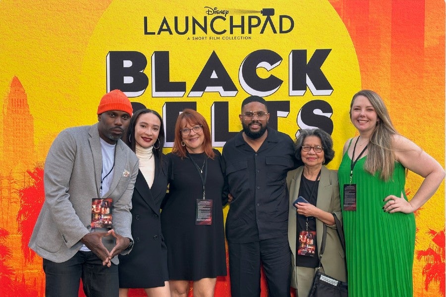 Spencer Glover and his family on the red carpet at the premiere of Black Belts film