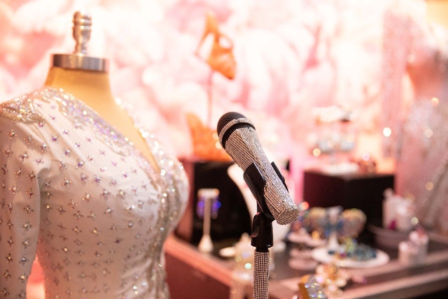 An outfit and artifacts and the Dolly and the Makers exhibit