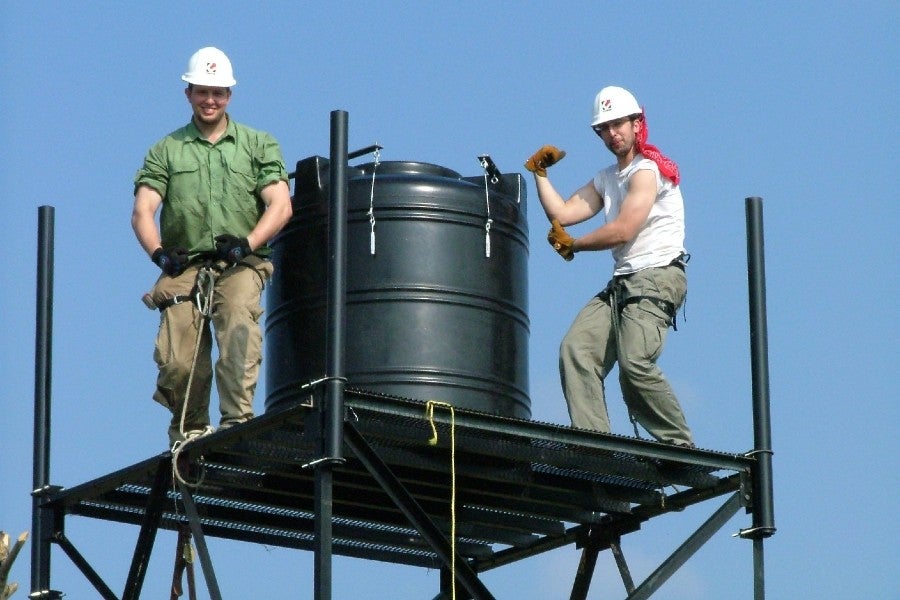 Two engineering students on the first mission trip in 2004