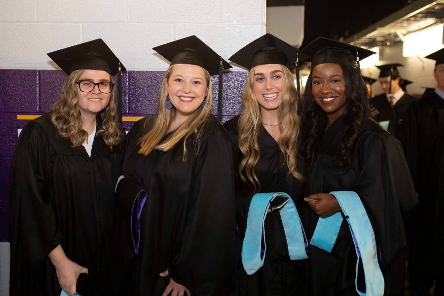 Students in the tunnel at commencement. 