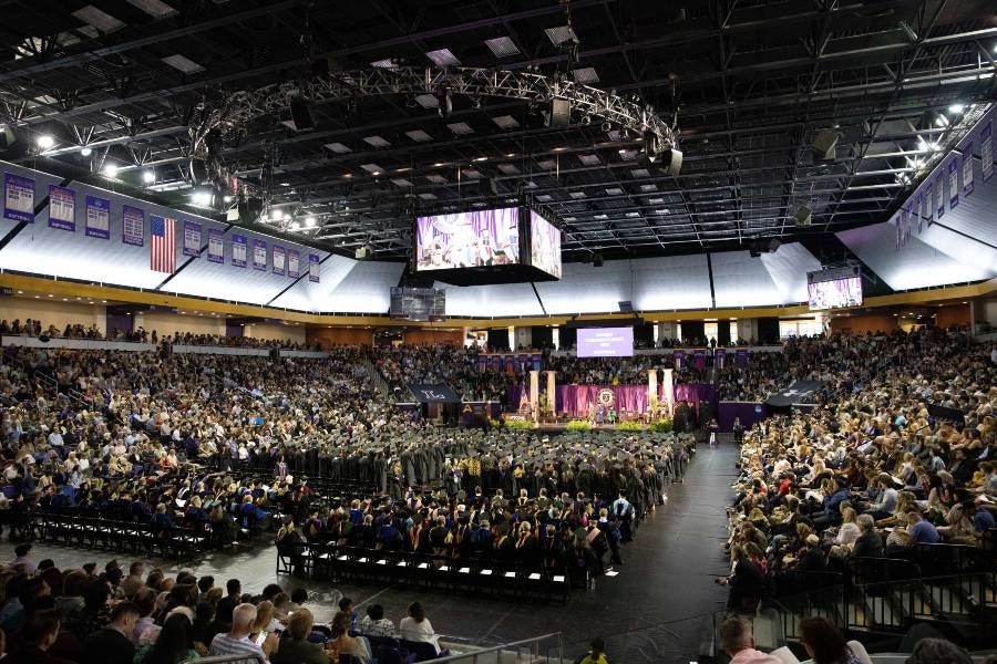 May 2025 undergraduate commencement in a packed Allen Arena.