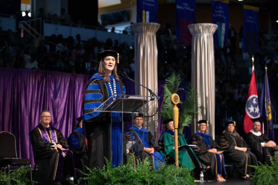 President Candice McQueen gives a presidential charge to graduates.