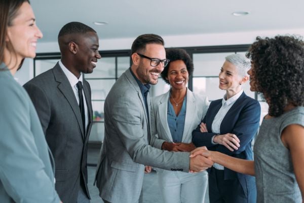 Professional shaking hands with a CEO