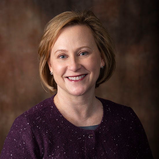 Kam Nola headshot