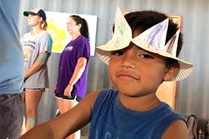 Local Baja child with a paper hat.