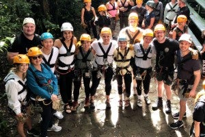 Group of students in rock climbing gear.