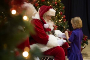 Children talk to Santa Claus
