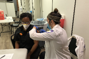 Student Giving Vaccine