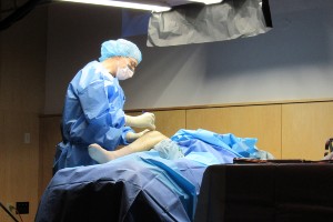 Dr. David LaVelle carrying out a knee surgery