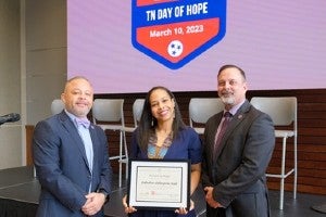 Dr. DeAndrea Witherspoon Nash receiving her award