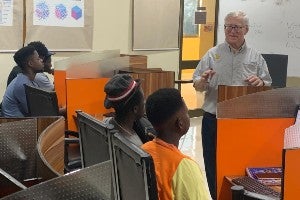 Andy Borchers teaches his students at Heritage College in Ghana