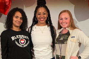 Reisha Kidd (center) with two TPOM participants