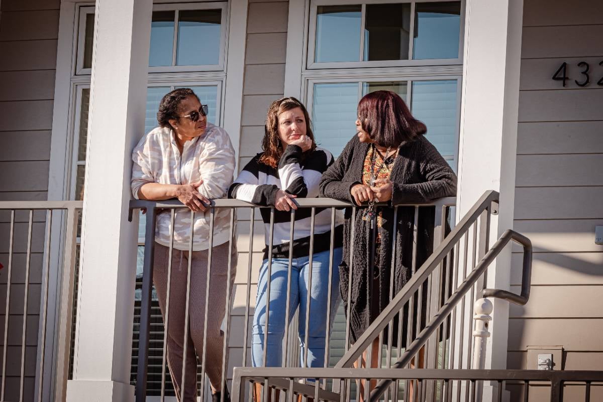 TPOM residents and the house shepherd at a transitional house in South Nashville.