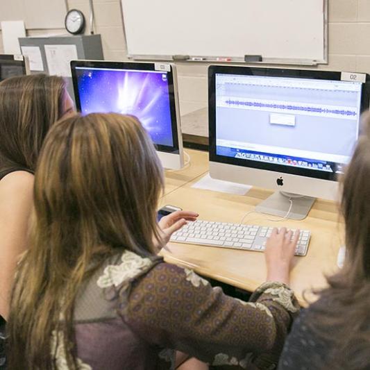 Student working at computer.