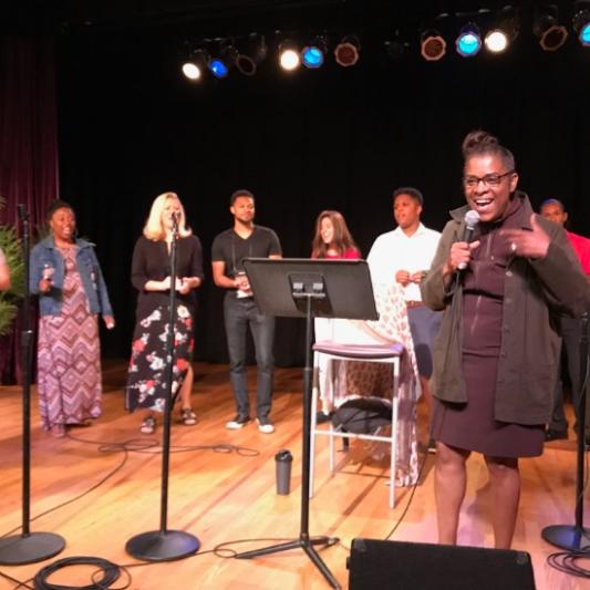 Odessa Settles performing with ENGAGE participants