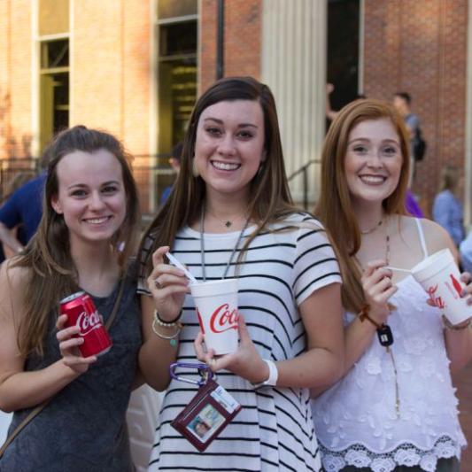 Students with chick-fil-a cup