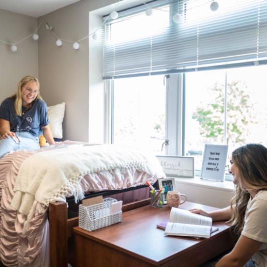 students in dormroom