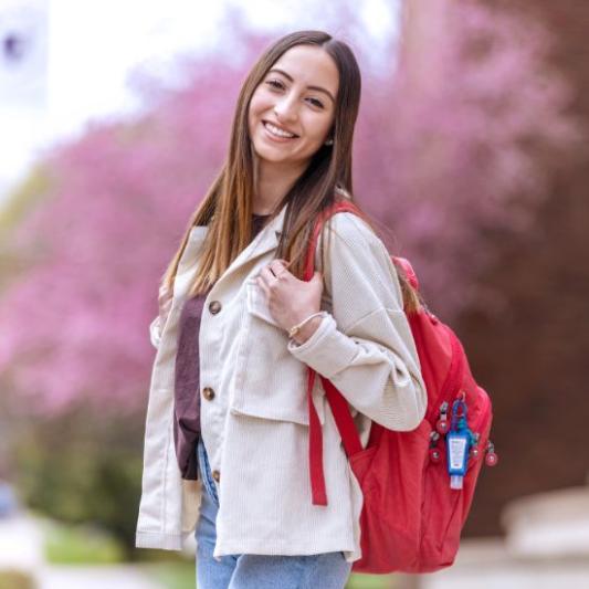 student with backpack