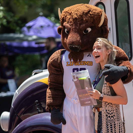 Student with Lu the Bison