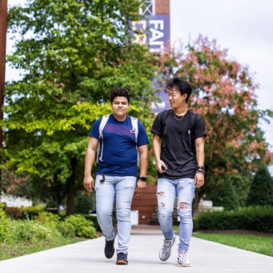 students walking on campus