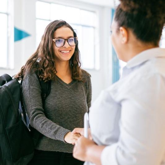 Student shaking an employers hand