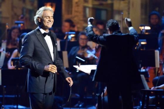 Andrea Bocelli singing on stage
