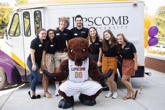 Students and the bison in front of the Lipscomb truck.